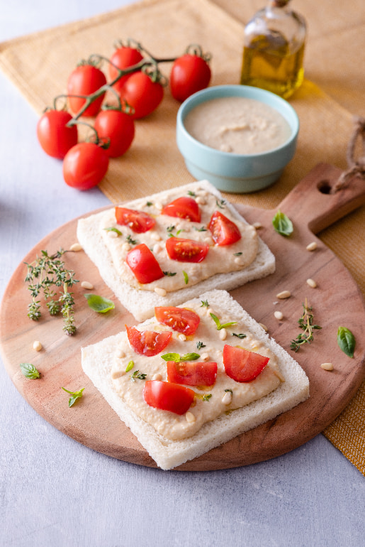 SPUNTINELLE WITH HUMMUS, CHERRY TOMATOES AND BASIL